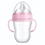 Baby's bottle with spoon